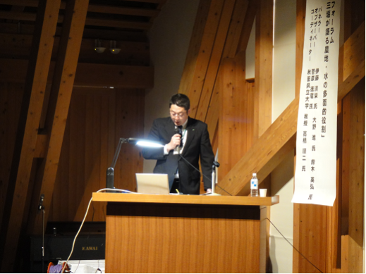 画像:活動報告をする伊藤清栄氏