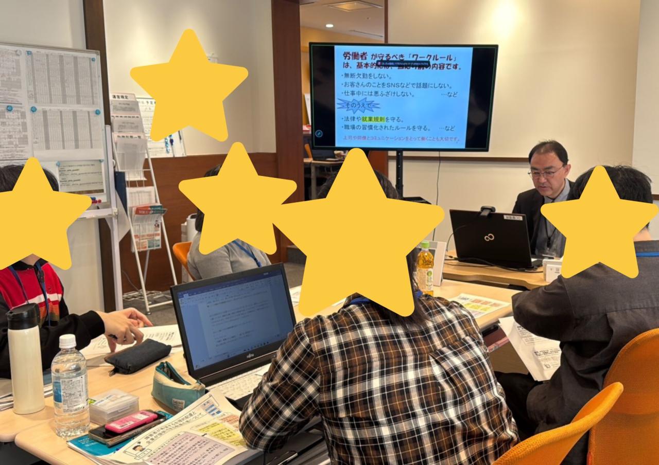 説明する事務局職員